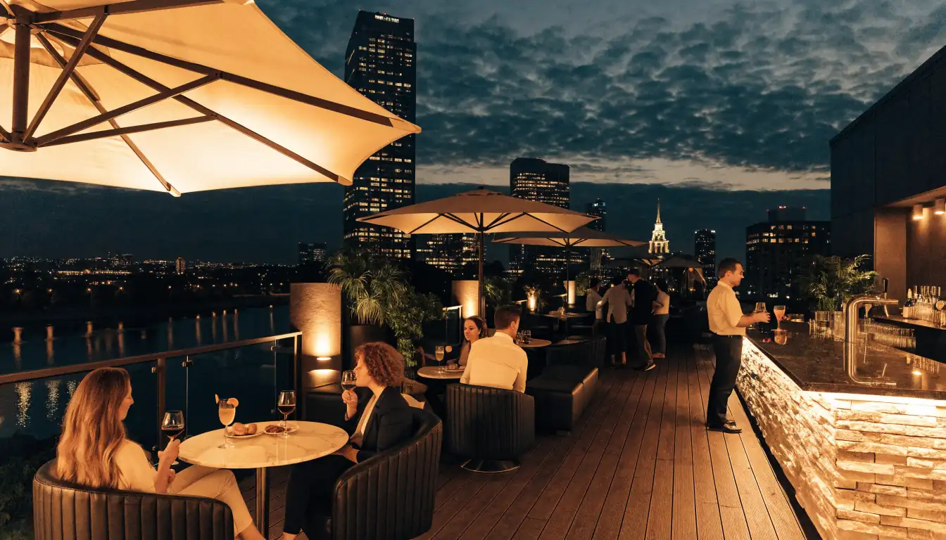 Rooftop bar with city skyline view above Adelaide Casino at night